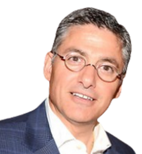 Individual in professional attire with glasses, representing leadership in healthcare and investment sectors, relevant to KVLR Capital's executive team.