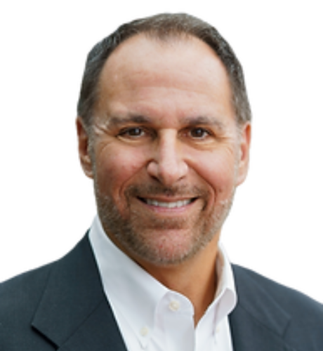 Headshot of a professional man in a suit, representing leadership at KVLR Capital, emphasizing expertise in investment strategies and partnership opportunities.